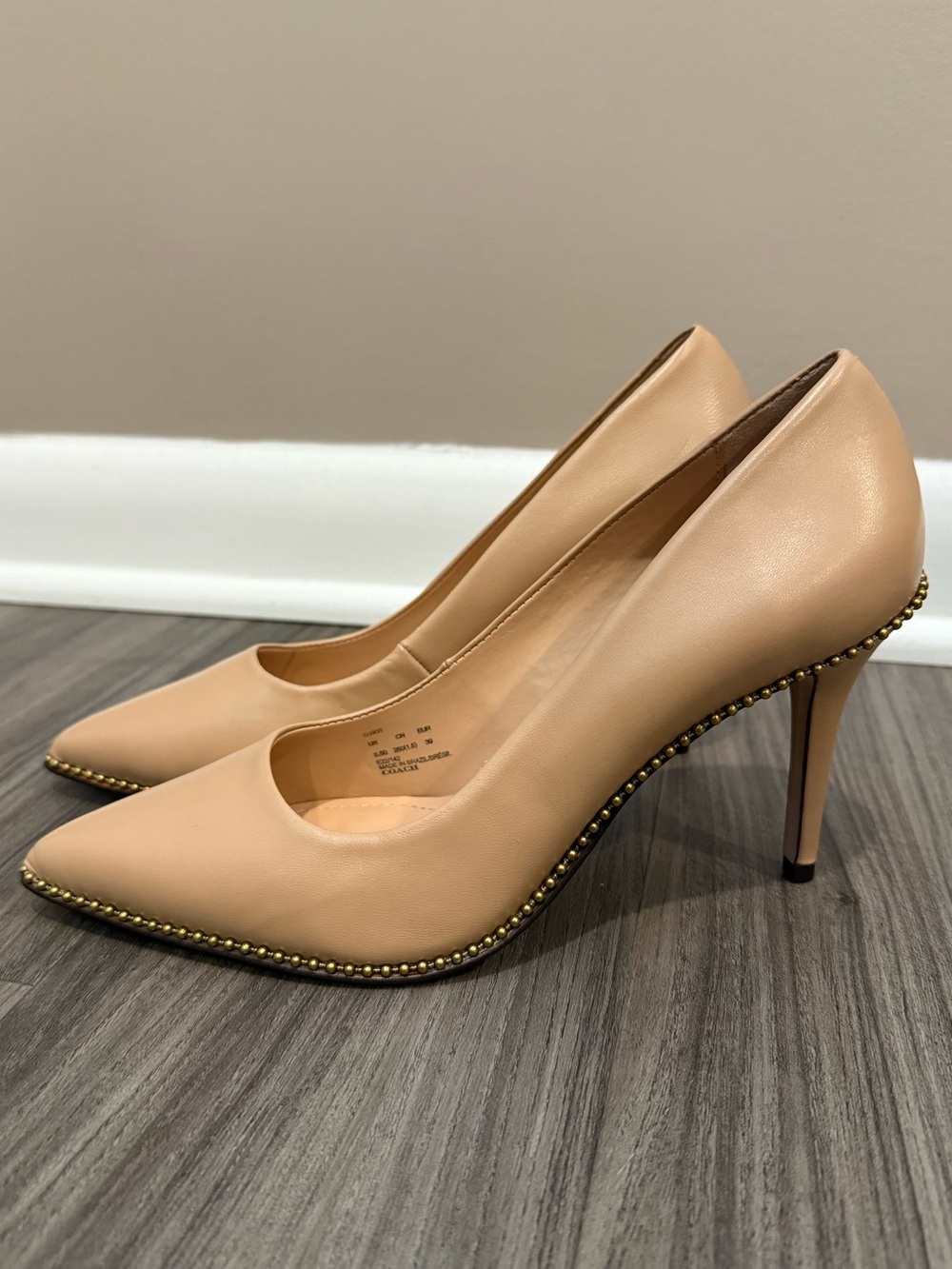Coach studded pumps